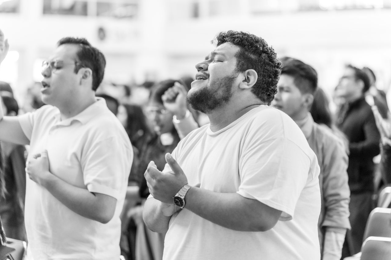 Adults in an uplifting worship session, embracing spirituality in Ciudad de México.